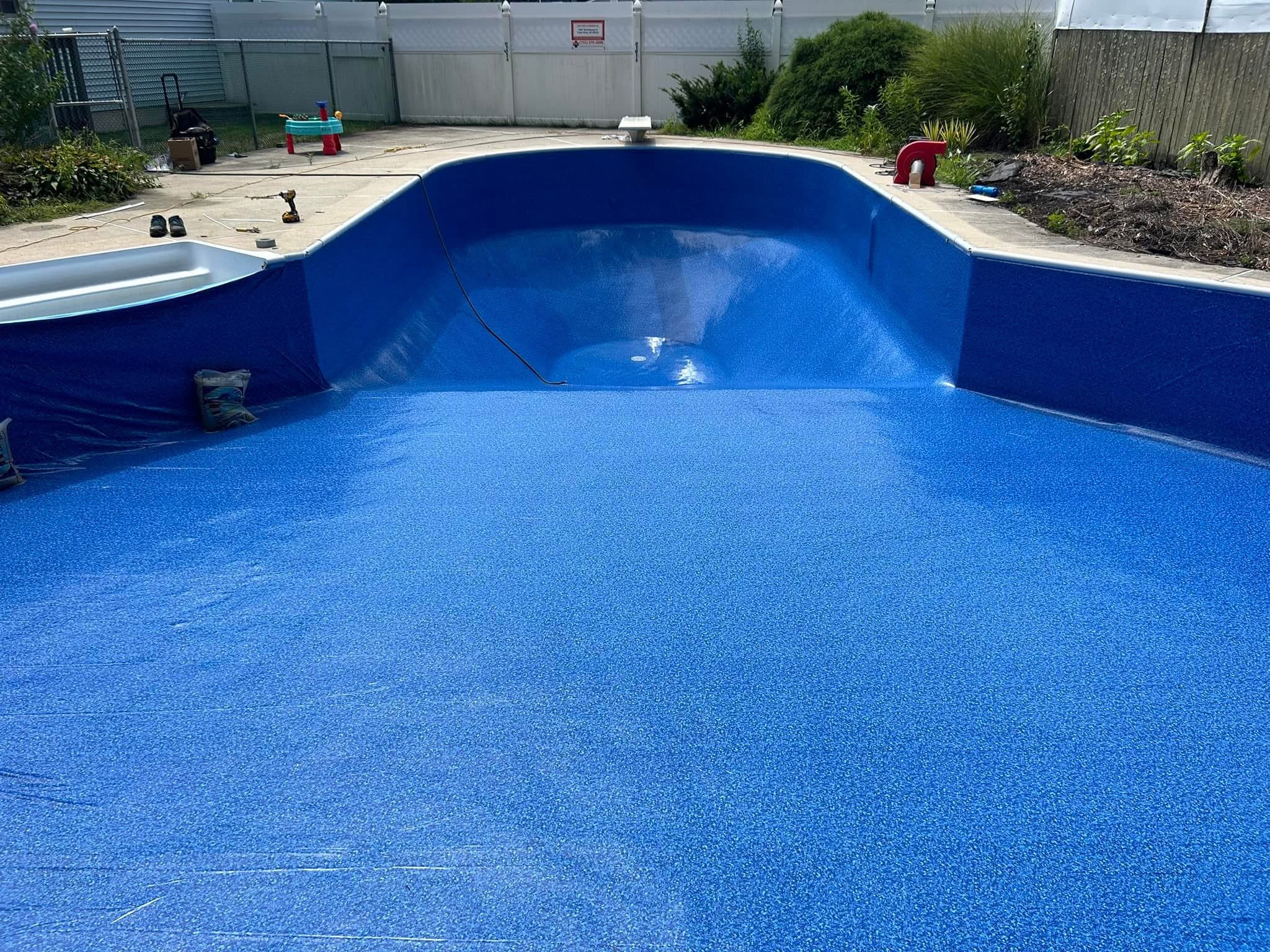 Same pool with brand new blue vinyl liner installed