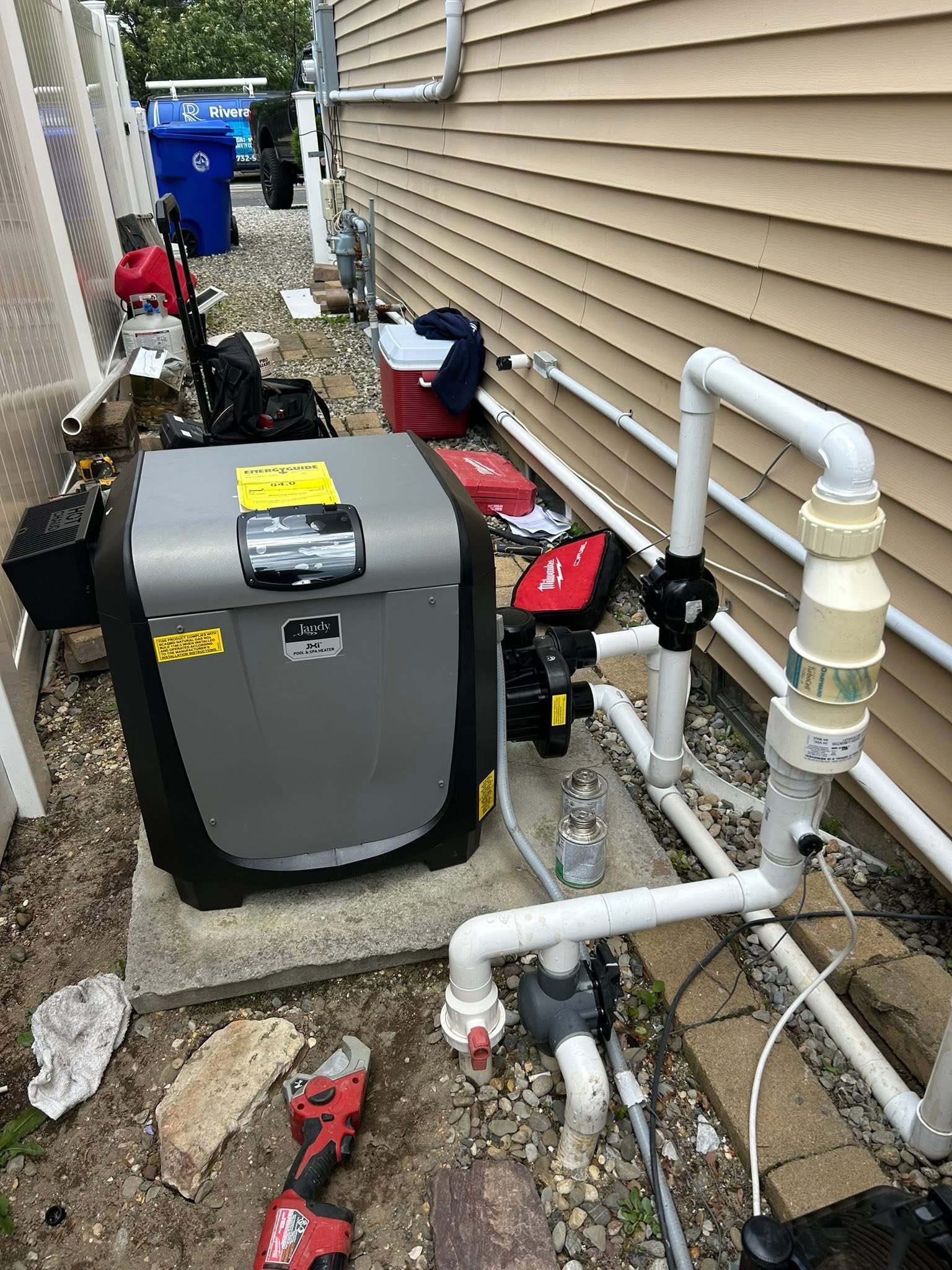 Jandy heater and full plumbing setup installed by Rivera Pool Service